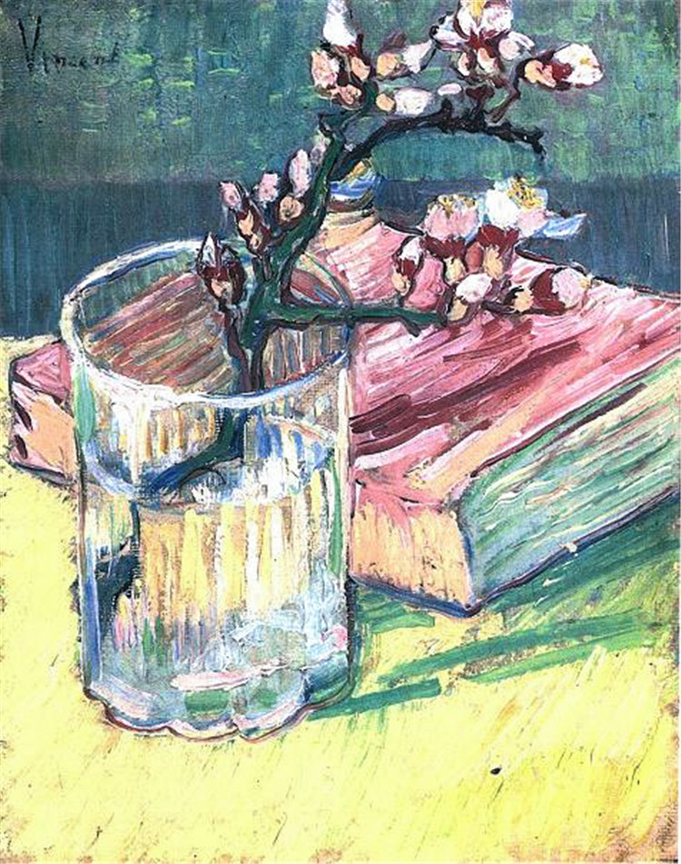 Blossoming Almond Branch In A Glass With A Book